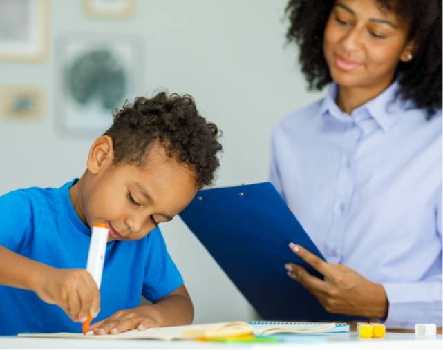 A child participating in activities during home-based autism therapy
